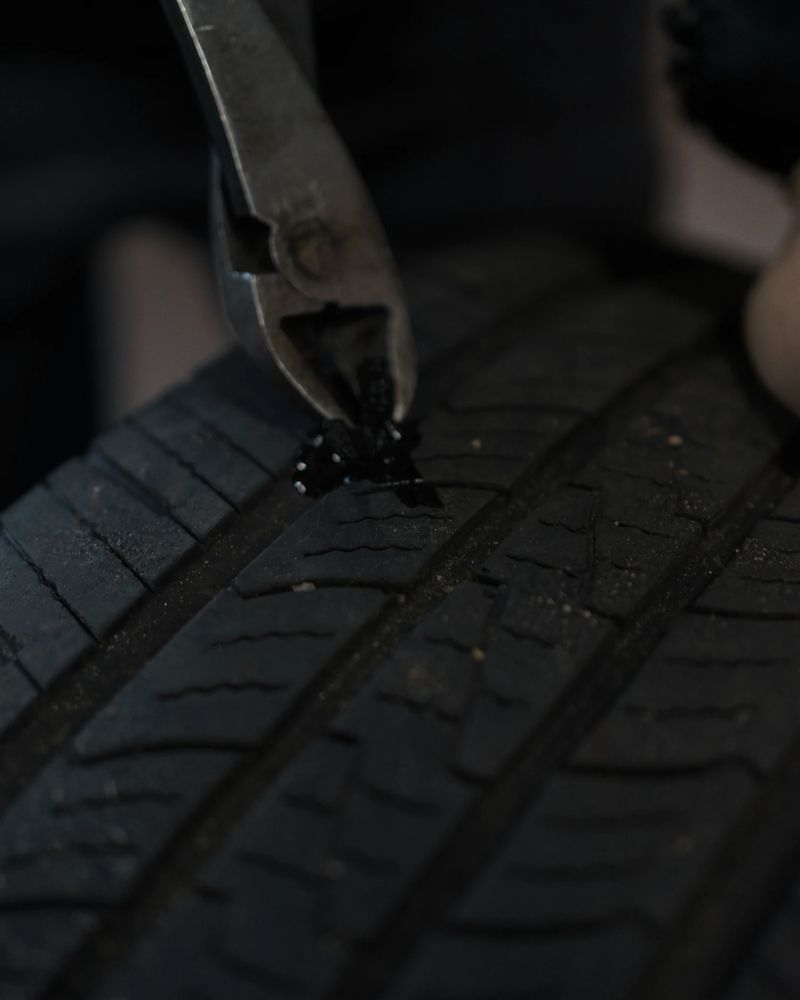 Plugging a puncture in a tire tread